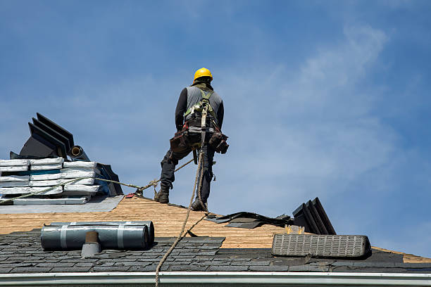 Professional Roofing technician working in Home, PA